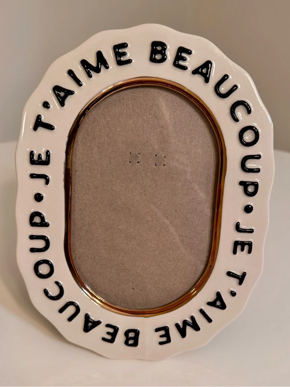 Anthropologie White Ceramic Oval Frame with Black Script and Gold Trim